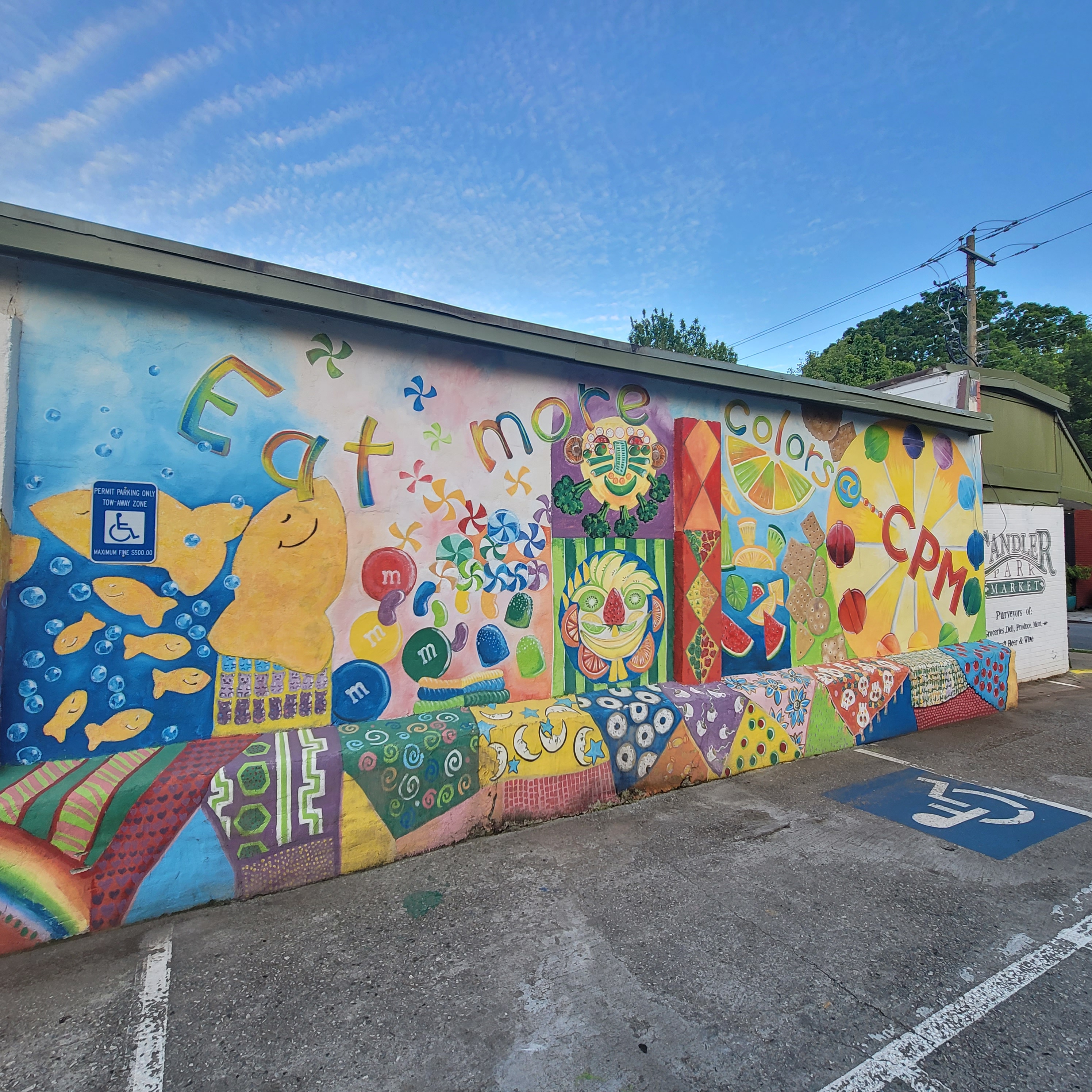 colorful mural painted on a brick wall